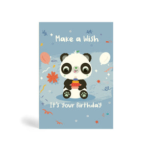 A6 blue eco-friendly, tree free, birthday greeting card with confetti, balloons and flowers in the background. The card is showing Panda sitting down with a yummy birthday cake and saying, Make a wish, it’s your Birthday!