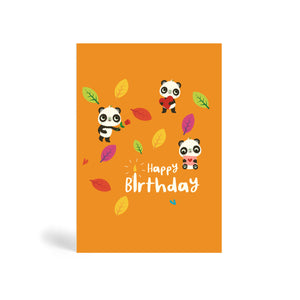 A6 orange eco-friendly, tree free, birthday greeting card showing three Pandas enjoying a birthday party surrounded by autumn leaves. One Panda is holding a red rose, another is holding a heart shape and the third one is holding a greeting card in an envelope. The card says, Happy Birthday.