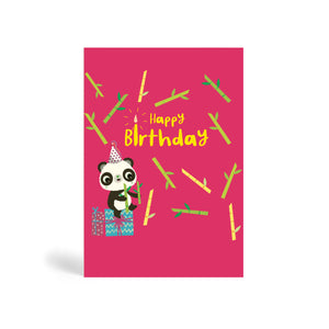 A6 pink eco-friendly, tree free, Happy Birthday Panda with Bamboo greeting card with Panda wearing a party hat sitting on presents and holding bamboo sticks and more bamboo stick in the background.