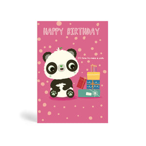 Pink with circle pattern background A6 eco-friendly, tree free, birthday greeting card showing Panda sitting beside a pile of present with birthday cake and candles on top. The card says, Happy Birthday. It’s time to make a wish.