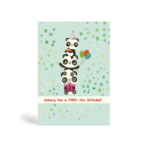 A6 Light green with dots background eco-friendly, tree free, birthday greeting card with three Pandas Piggyback on top of each other. The top Panda is wearing a party hat and holding a cake, the middle Panda is holding balloons and the Panda at the bottom is sitting down and holding a purple present. The card says, wishing you a PANDA-stic Birthday.