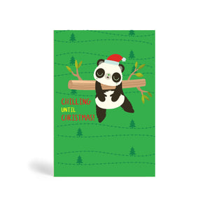 Green A6 Eco-Friendly Christmas greeting card with Christmas tree background design made from bamboo and cotton linters with image of Panda sleeping hanging from a tree. The card says Chilling Until Christmas!