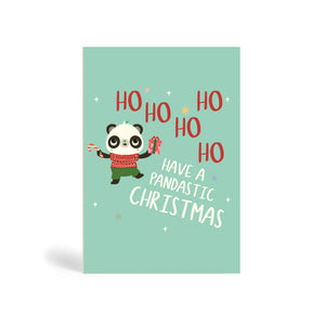 Teal A6 Eco-Friendly greeting card made from bamboo and cotton linter with snow in the background and image of Panda wearing a red Christmas sweater and green trouser holding a present in one hand and a candy cane in the other. The card says, Ho Ho Ho Ho Ho, Have a Pandastic Christmas.