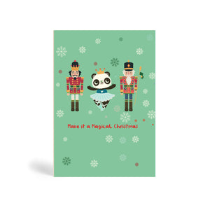 Teal A6 Eco-Friendly greeting card made from bamboo and cotton linter with snow in the background and image of Panda wearing a ballet costume and dancing, with two Nutcracker characters on her left and right. The card says, Make it a magical Christmas.