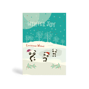 Light blue A6 Eco-Friendly, biodegradable, recyclable, green, tree-free Winter joy, Christmas Wishes – with three Pandas having a playful snowball fight with snow and trees in the background. Cute eco-friendly Christmas card.