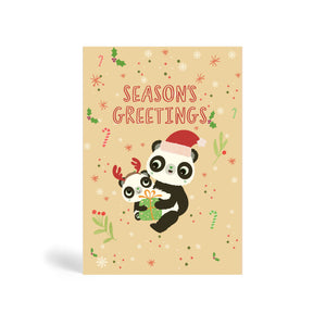 Cream A6 Season’s Greetings Eco Christmas Card made from bamboo and cotton linter with snowflakes, candy cane and mistletoe in the background and image of a Panda mother wearing Santa hat and hugging a baby Panda with antler holding Christmas present.